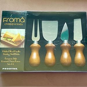 NIB Froma set of four cheese knives